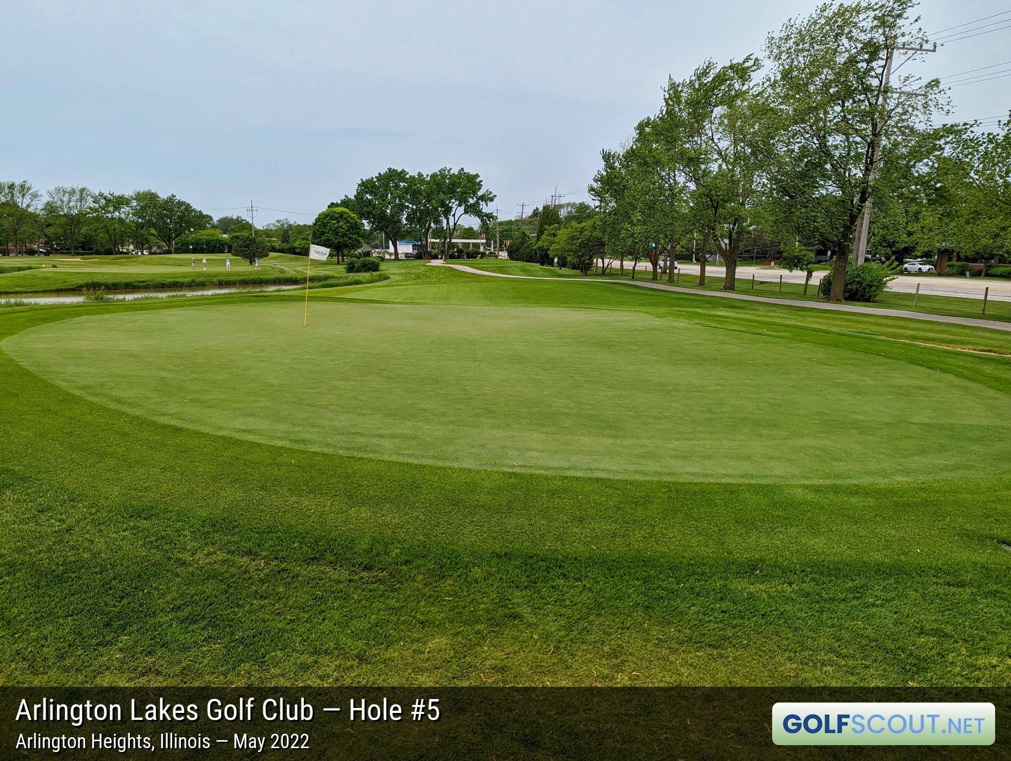 Photo of hole #5 at Arlington Lakes Golf Club in Arlington Heights, Illinois. View of the hole from the back of the green.