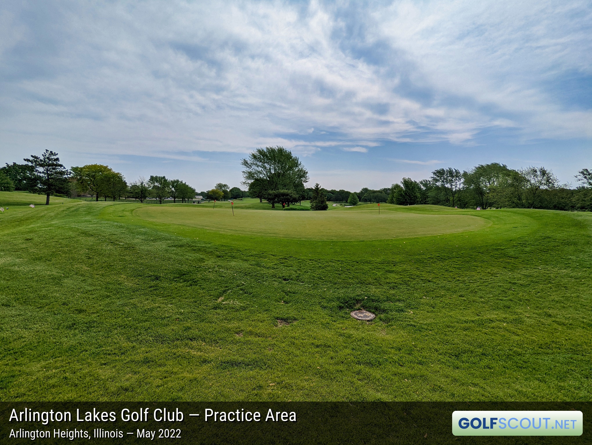 Photo of the practice area at Arlington Lakes Golf Club in Arlington Heights, Illinois. There's one practice green at Arlington Lakes, where you can both chip and putt.