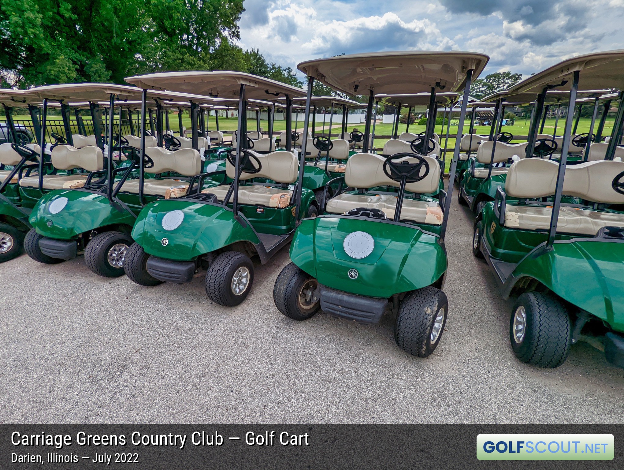 Photo of the golf carts at Carriage Greens Country Club in Darien, Illinois. For some reason, the seat of every golf cart had the corners damaged or torn out. Never seen that before. Literally every cart.