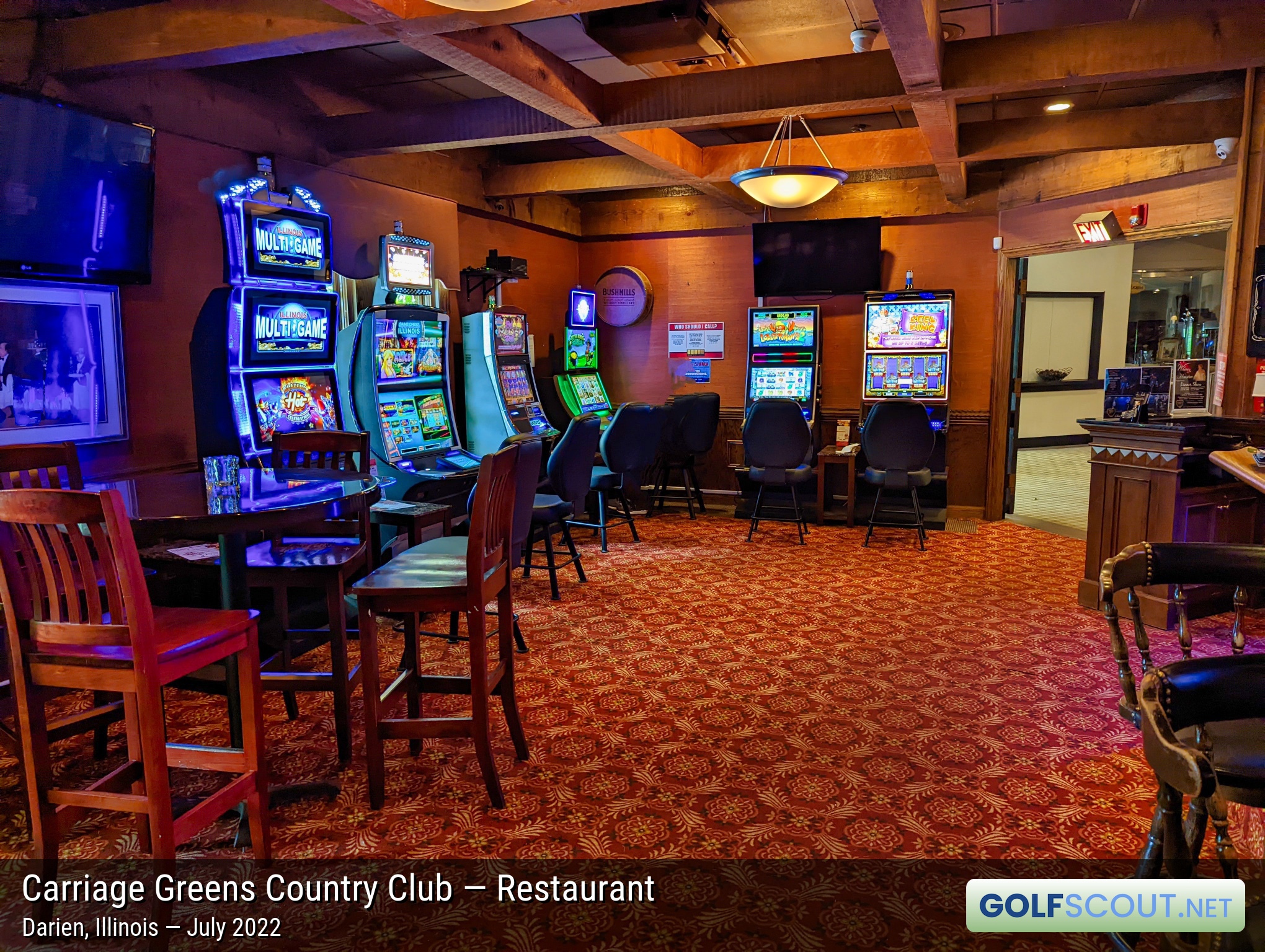 Photo of the restaurant at Carriage Greens Country Club in Darien, Illinois. There's a gambling area in the corner.