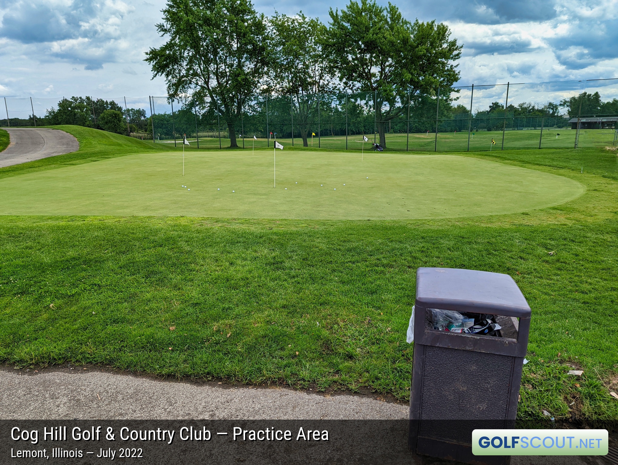 Photo of the practice area at Cog Hill Course #2 - Ravines in Lemont, Illinois. Another practice green, to the left of the range, when facing it from the parking lot.