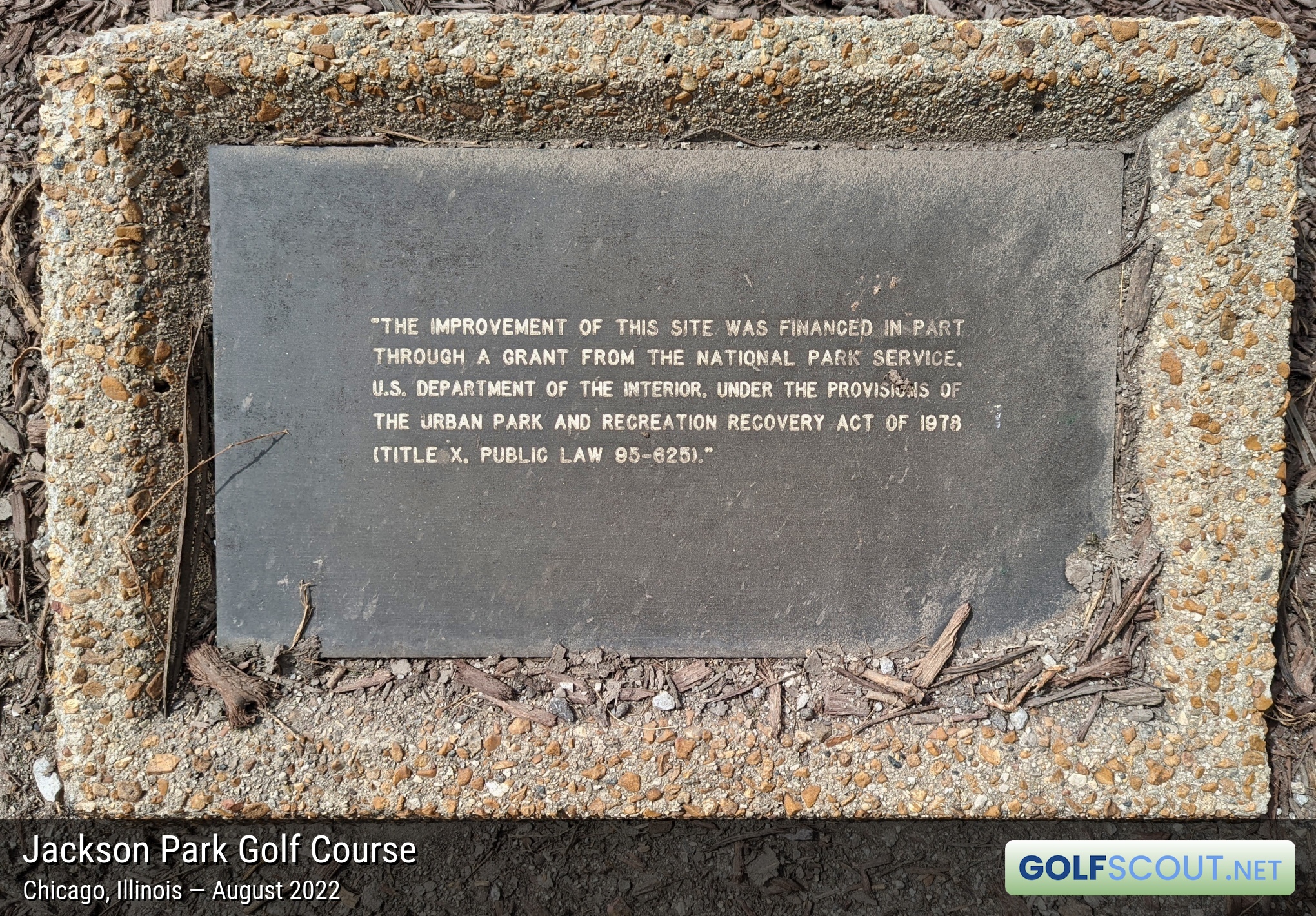 Miscellaneous photo of Jackson Park Golf Course in Chicago, Illinois. Near the first tee, there's a brick in the ground with the following inscription: "The improvement of this site was financed in part through a grant from the National Park Service. U.S. Department of the Interior, under the provisions of the Urban Park and Recreation Recovery Act of 1978 (Title X, Public Law 95-625)"