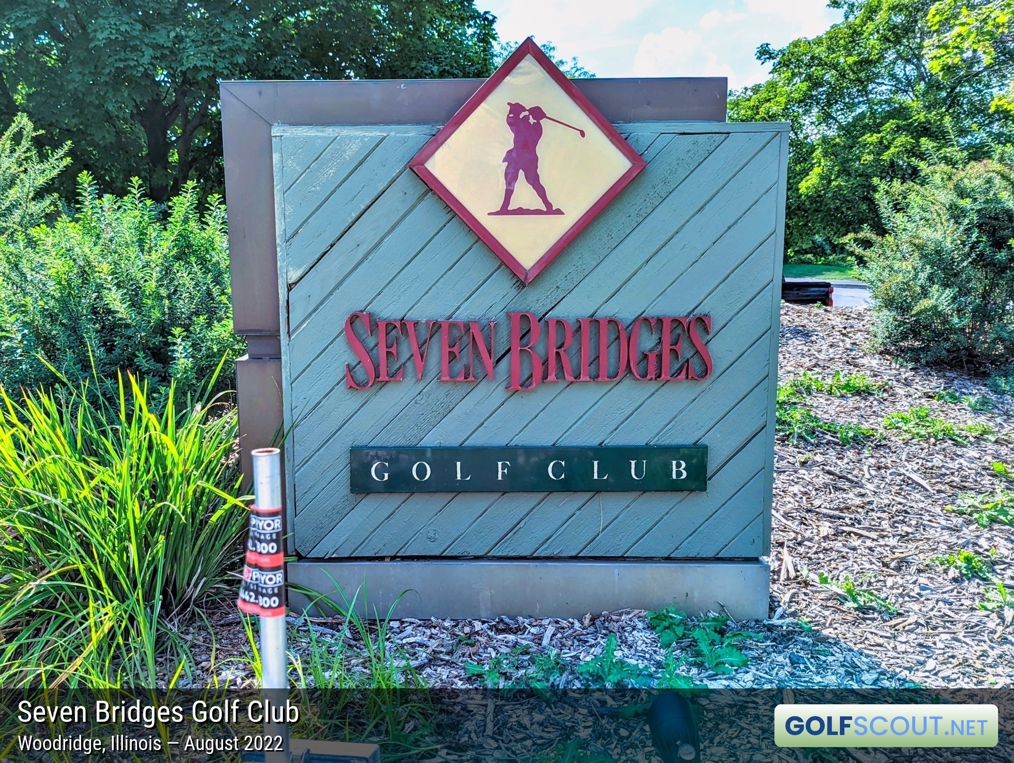 Sign at the entrance to Seven Bridges Golf Club