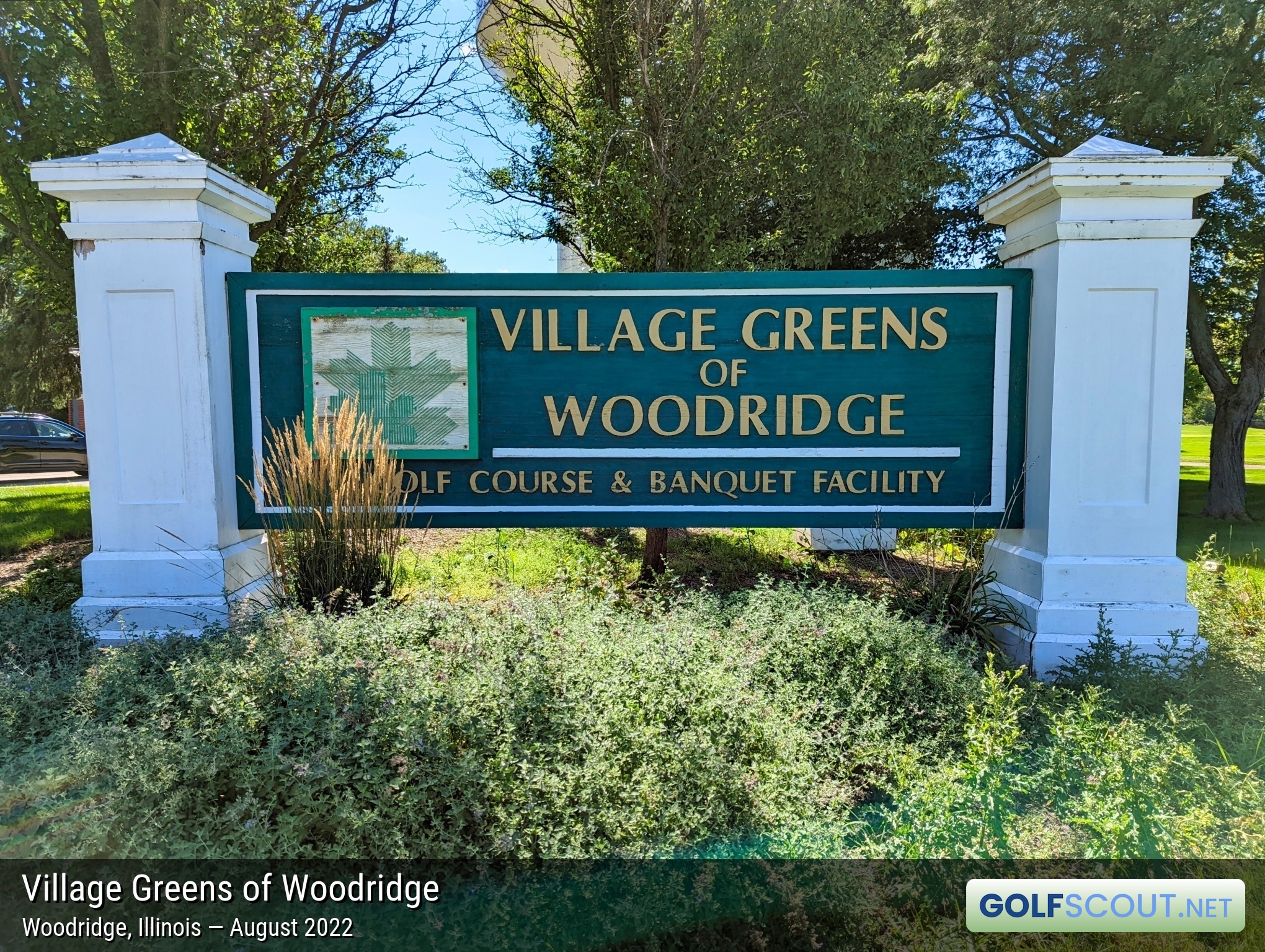Sign at the entrance to Village Greens of Woodridge
