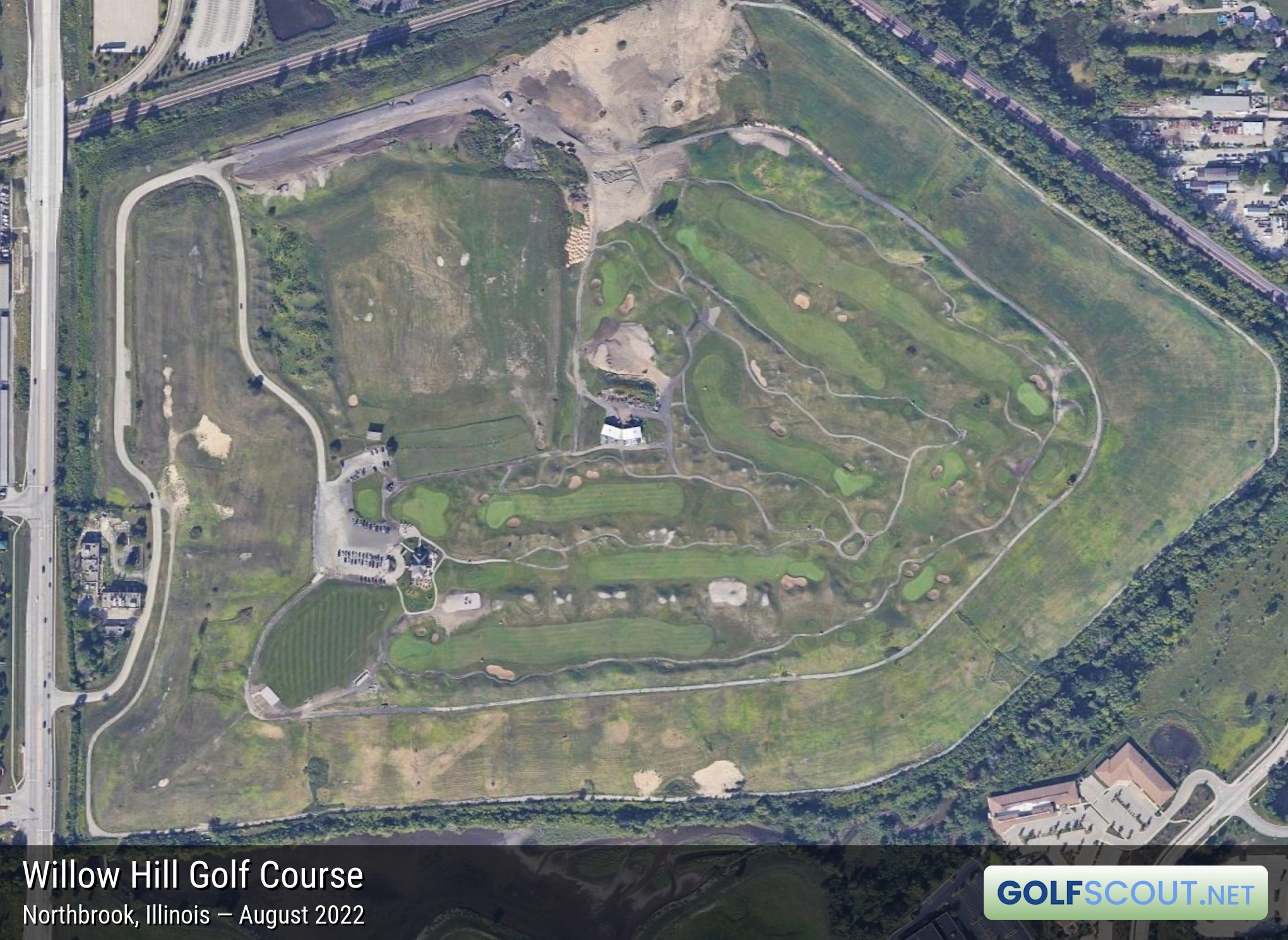 Aerial satellite imagery of Willow Hill Golf Course in Northbrook, Illinois. This satellite imagery doesn't show the golf dome, but it's located in the dirt area in the top center of the image (which is the west side of the property in reality).